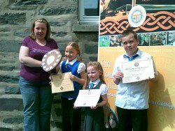 Comann nam Parant (Peairt) Shield, awarded for the first time in 2011: 1st, 2nd & 3rd place awarded to pupils from Whitehills Primary School Gaelic Medium class, Forfar. Presented by Catherine Stewart, Perth Comann nam Parant.
